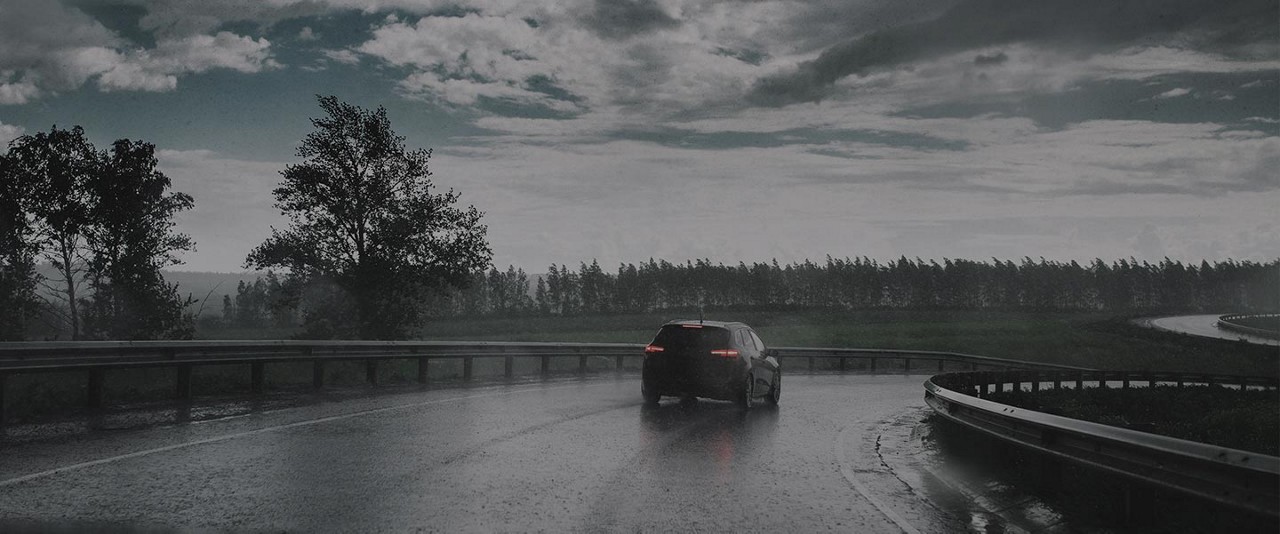 Car turning down a country road